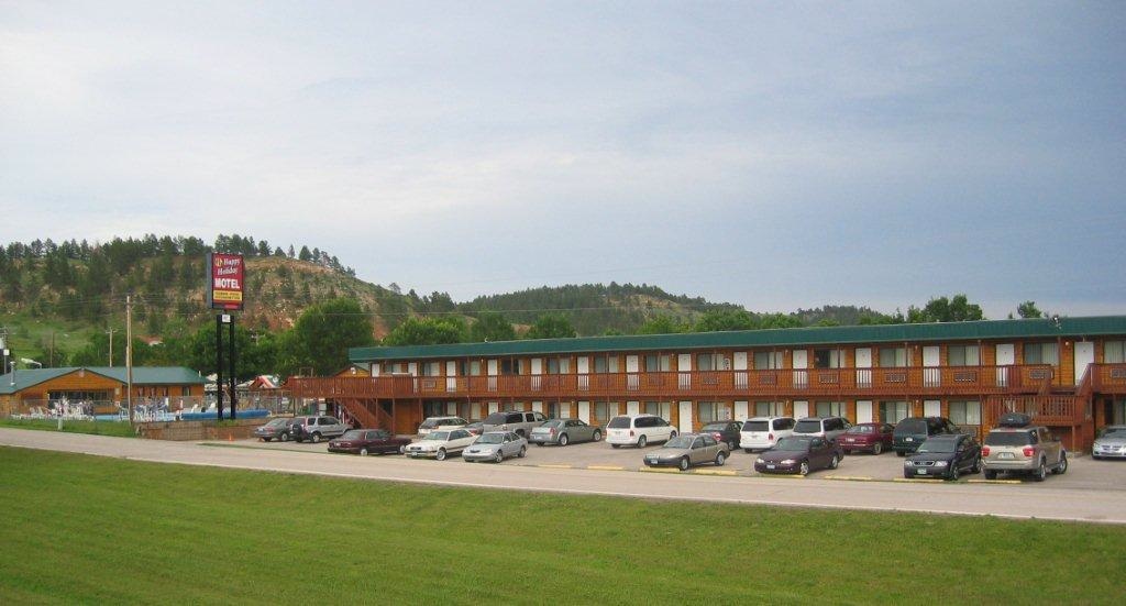 Happy Holidays Motel with outdoor swimming pool and convenient parking in Rapid City Black Hills.